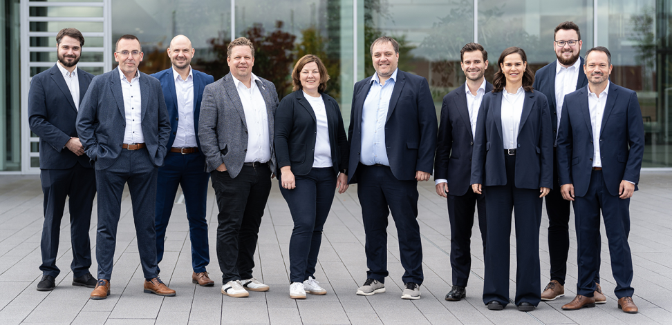 Group photo of the KubeOps management team.